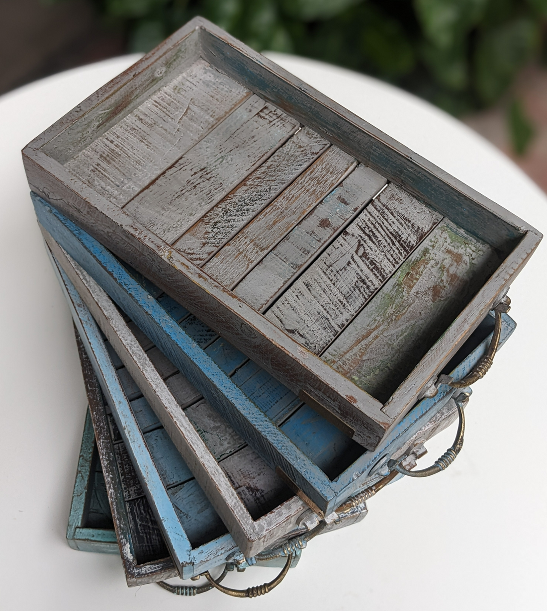 Decorative wooden trays in distressed colours