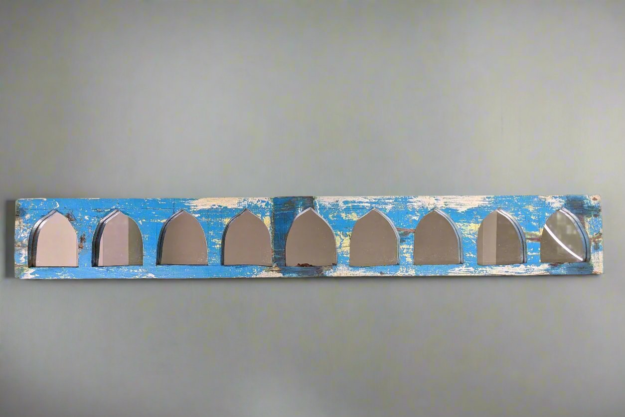 Small Jharokha mirrors in a horizontal row