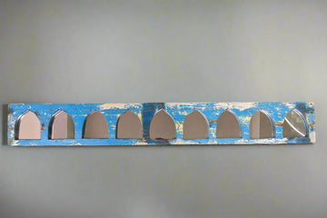 Small Jharokha mirrors in a horizontal row