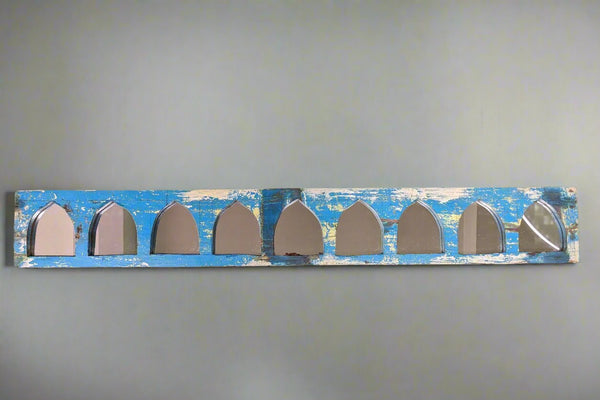 Small Jharokha mirrors in a horizontal row