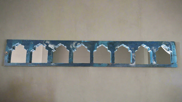 Small Jharokha mirrors in a horizontal row