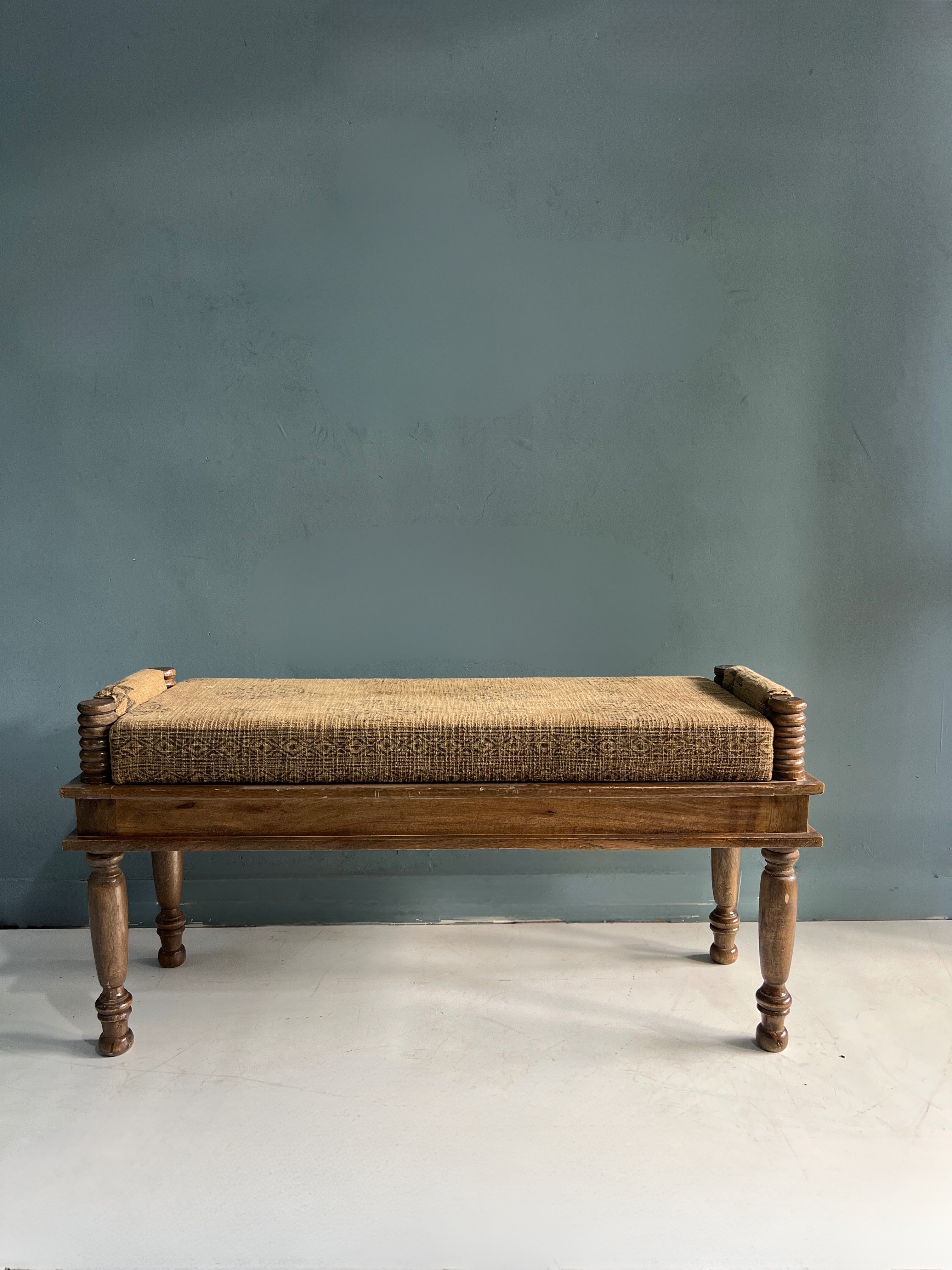Handcrafted wooden bench with wooven
