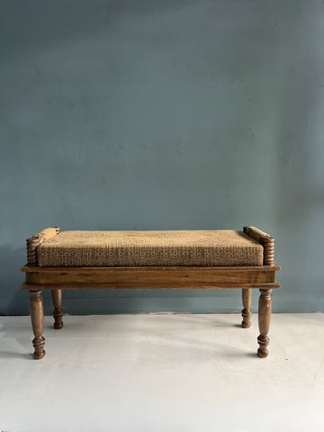Handcrafted wooden bench with wooven