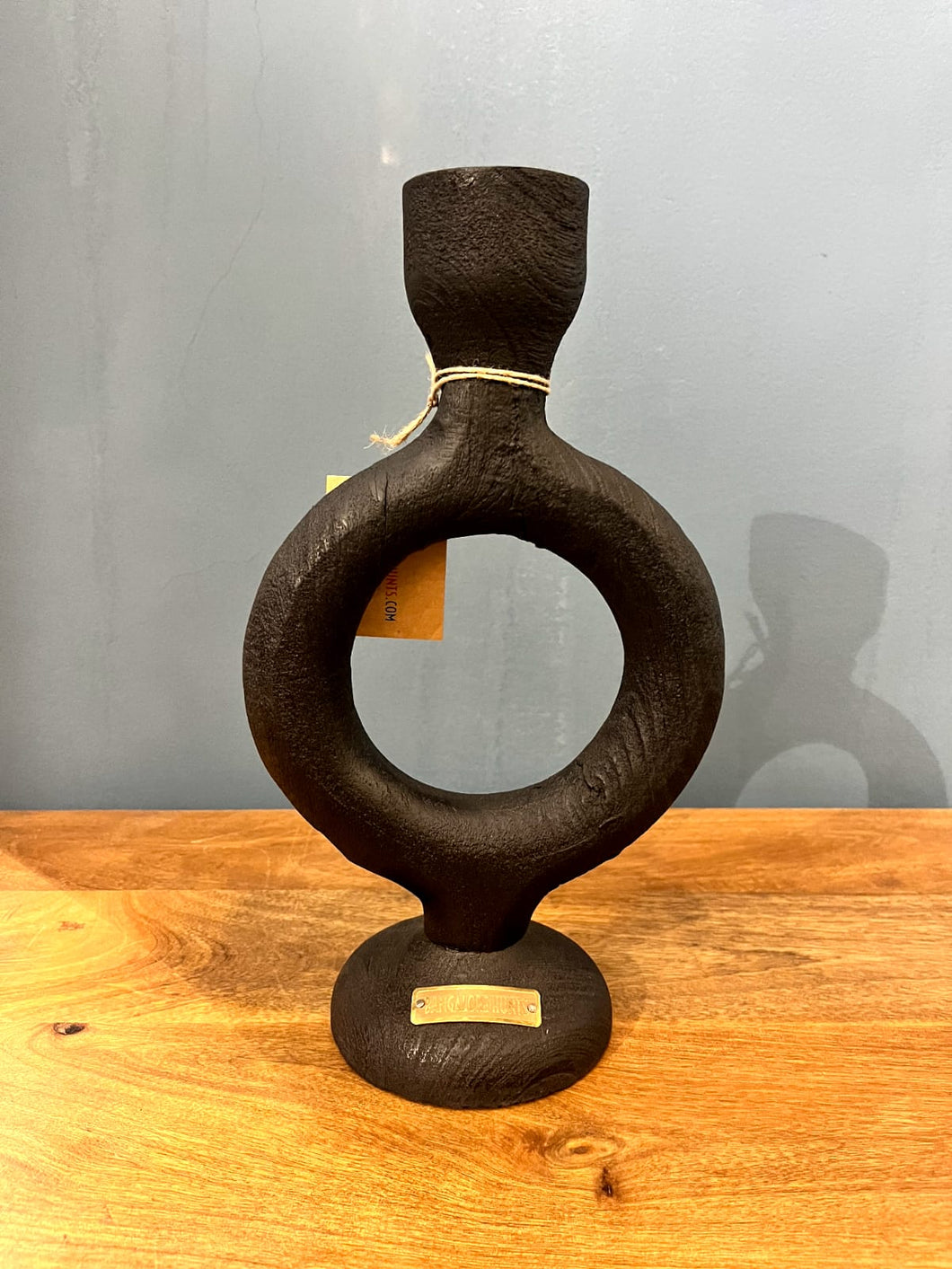 Black wooden candle holder