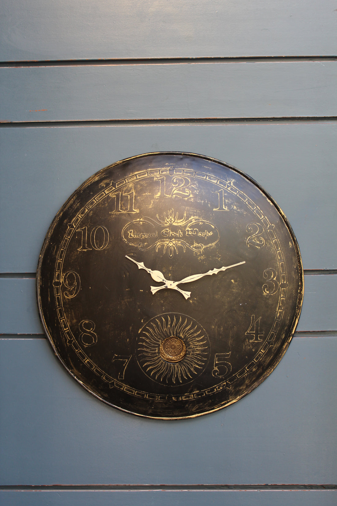 Round Clock with Pendulum