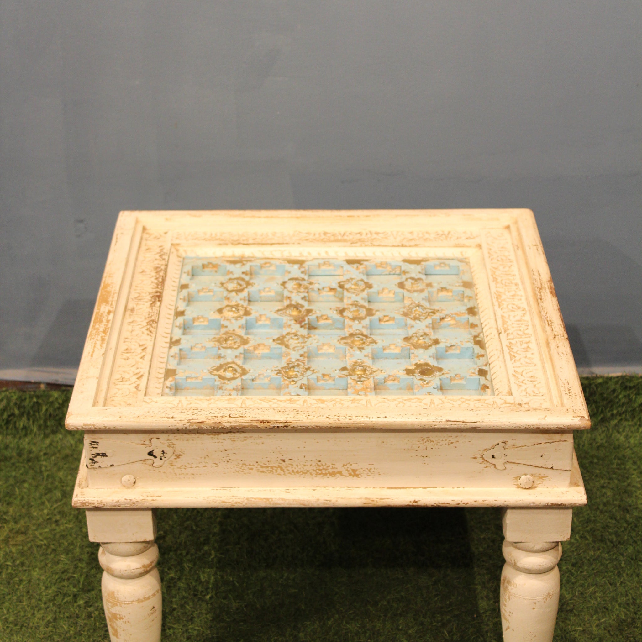 Cream and Blue Carved Side Table With Metal Embelishments