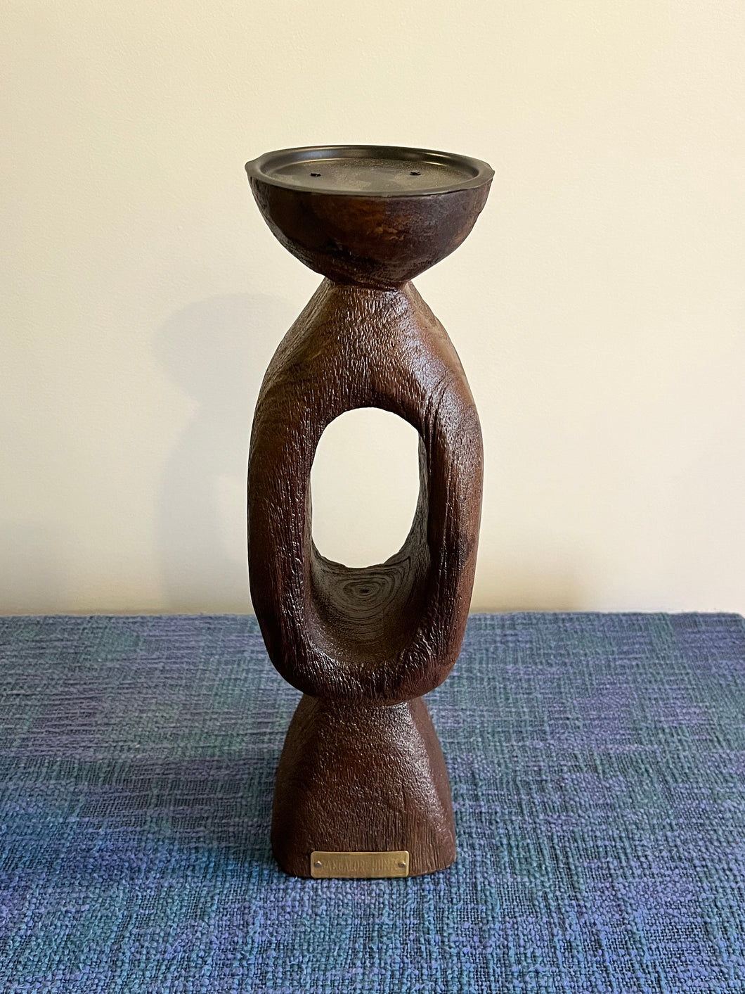 Brown wooden candle holder